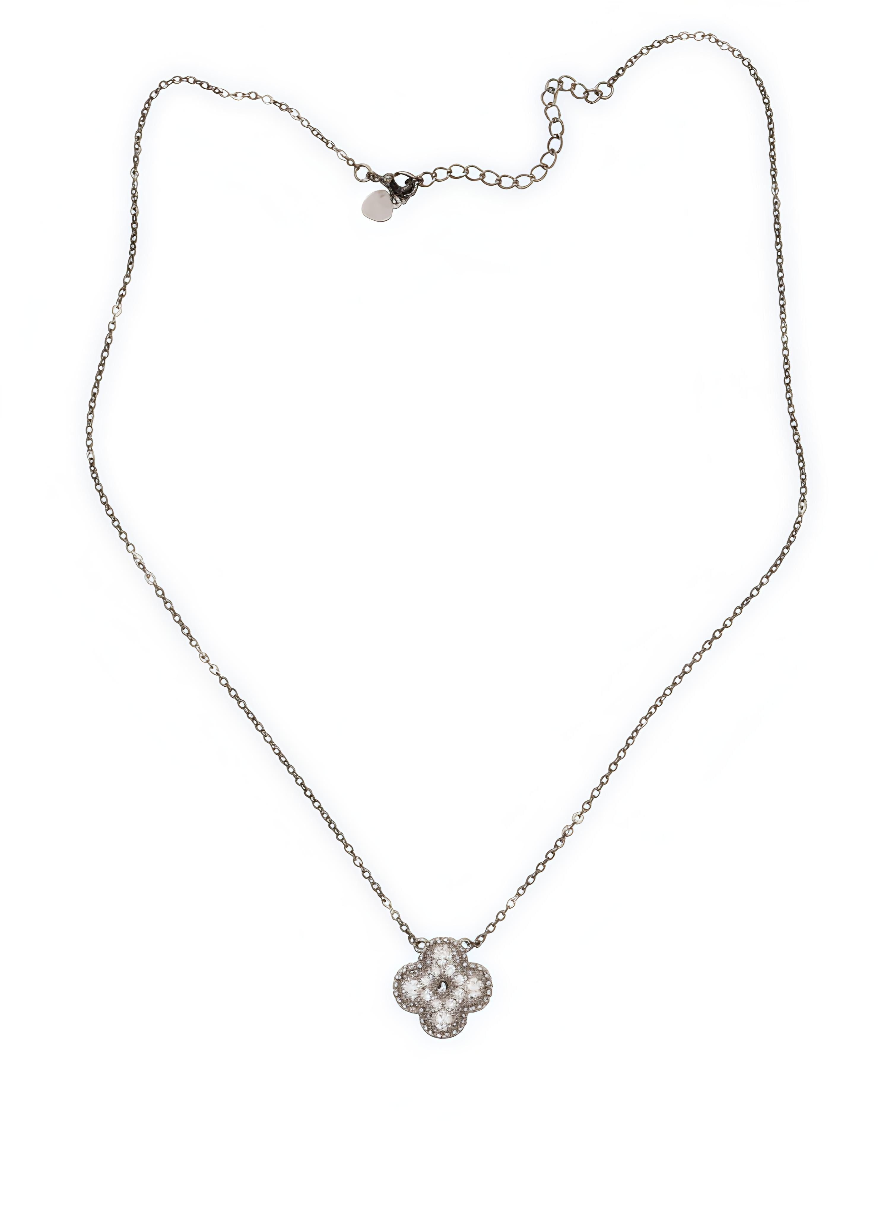 Necklace with a floral pendant on top view with white background