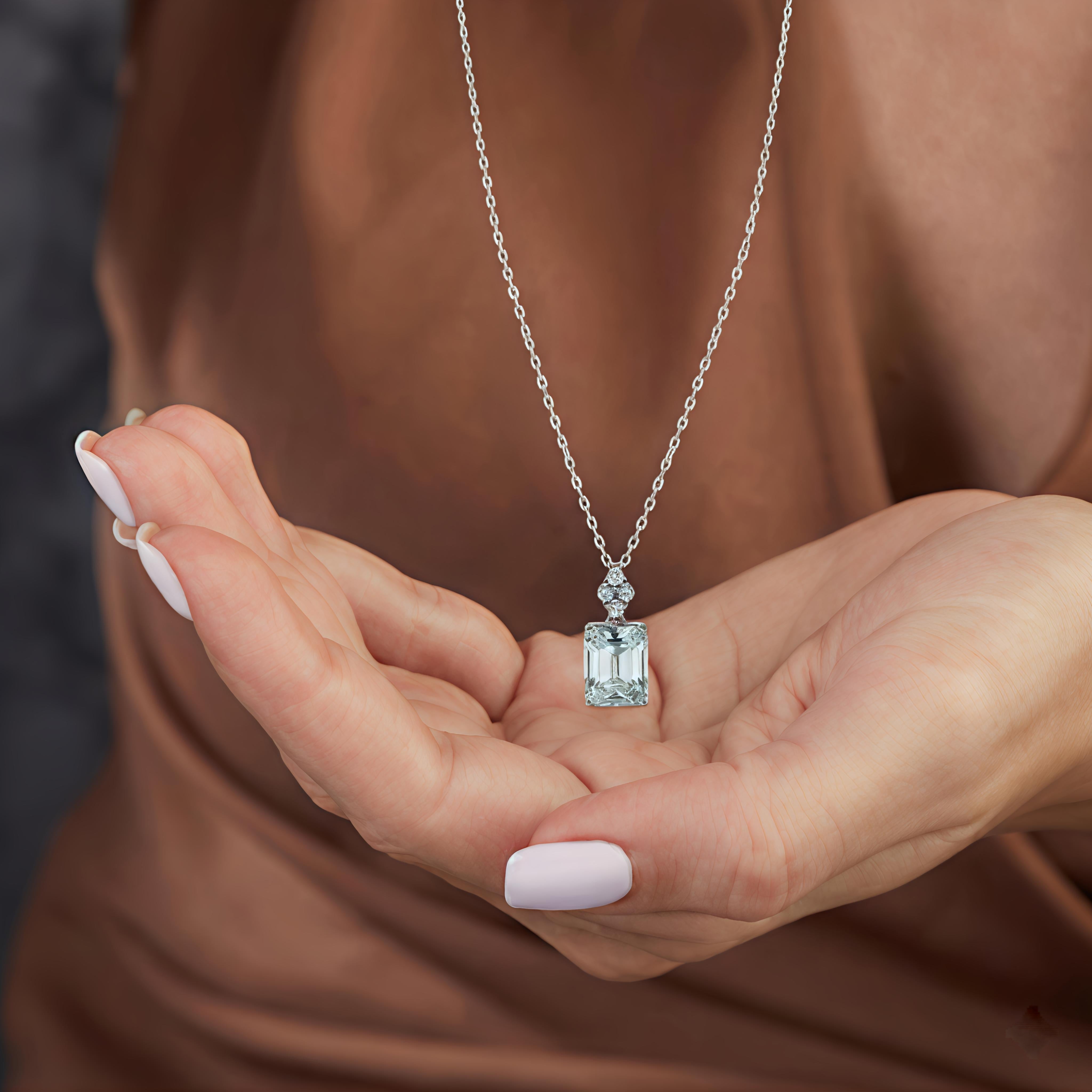 Necklace with a pendant held in hands against a brown background