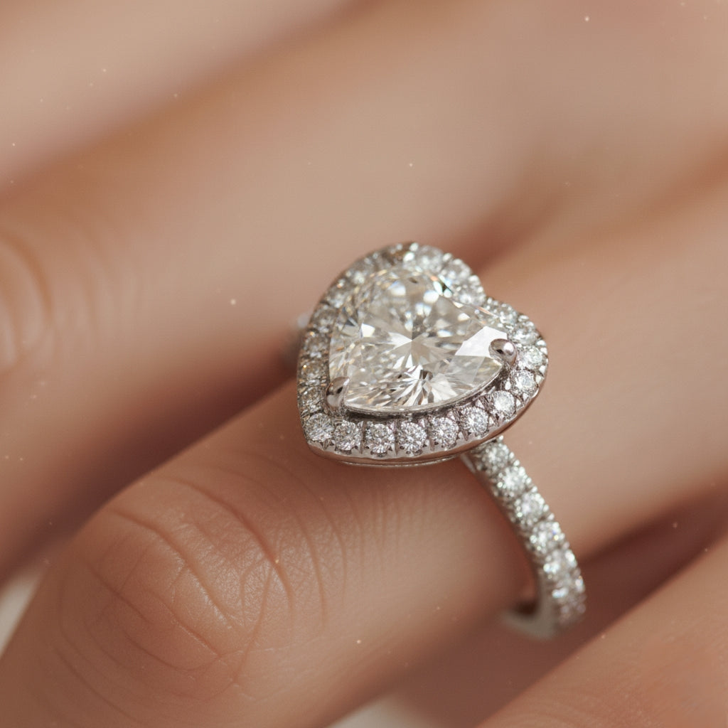 Diamond ring on a finger with a soft focus background